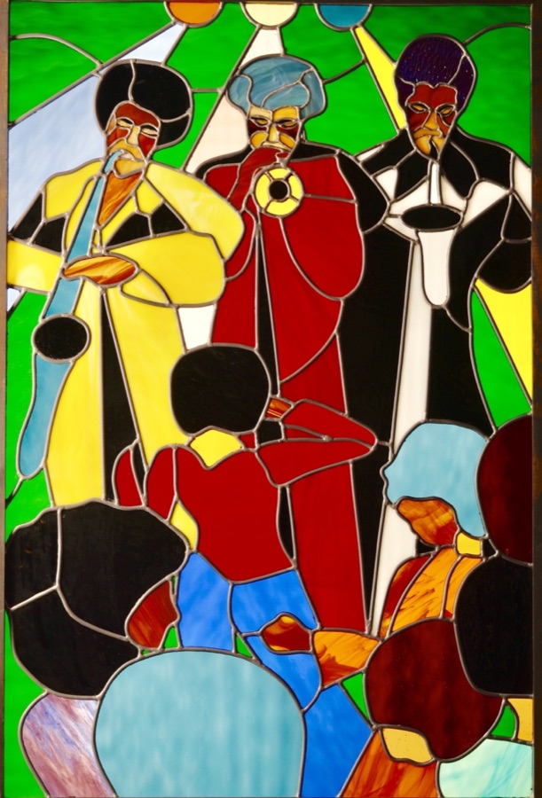 Stained glass — a band with a crowd